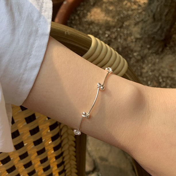 Kugelkreuz – Armband
