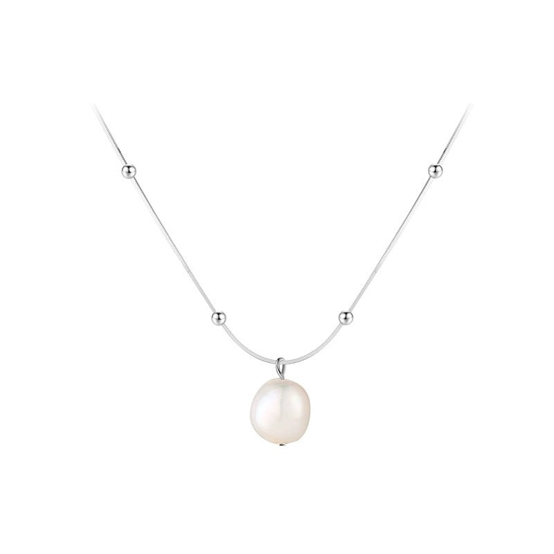 Perlenspur – Halskette mit Barockperle