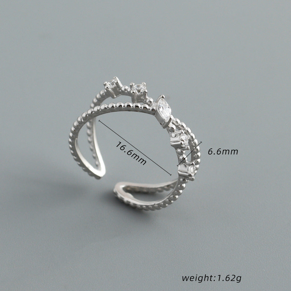 Kreuzspur – offener Ring mit Zirkonia
